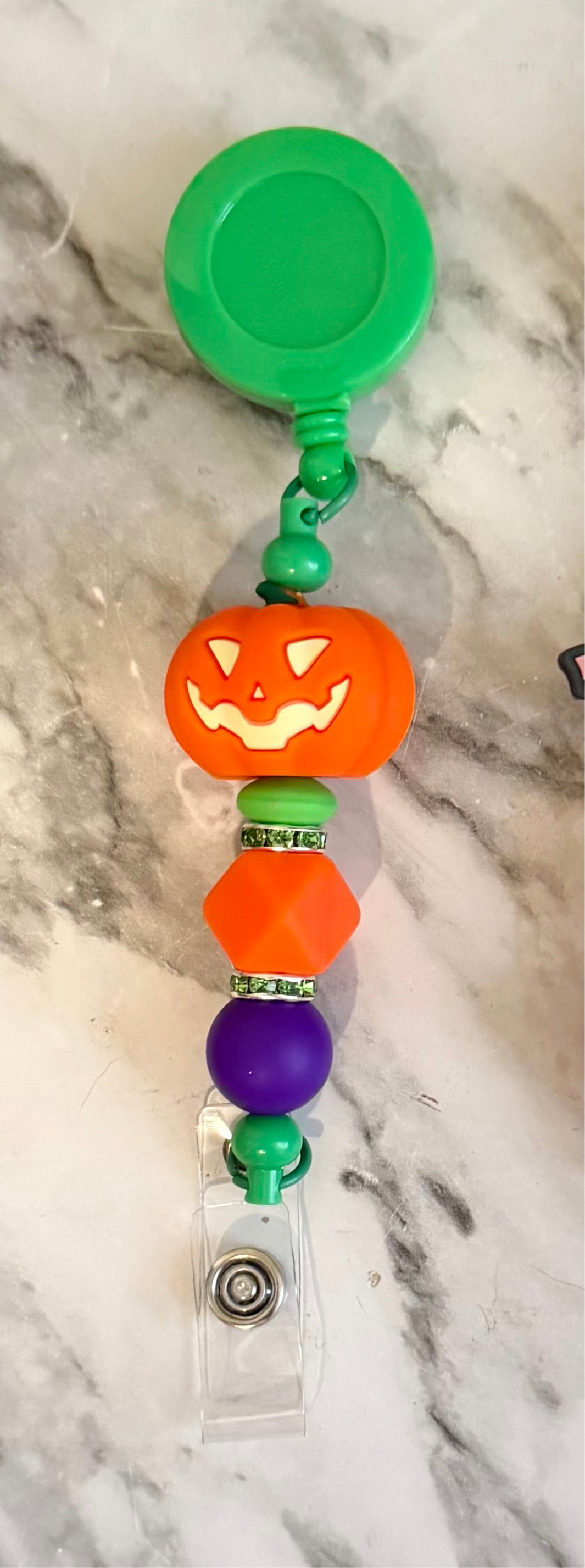 Pumpkin Badge Reel