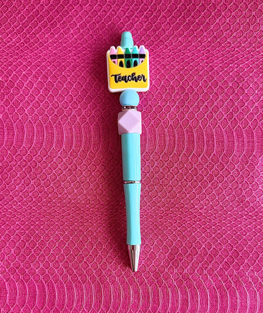 Light Blue Pen with a colorful teacher-themed top in shape of a crayon box with 'Teacher' text silicone focal bead
